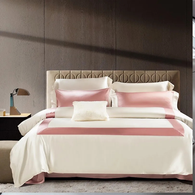 Bedroom with beautifully styled bed featuring luxurious linen set in elegant design.